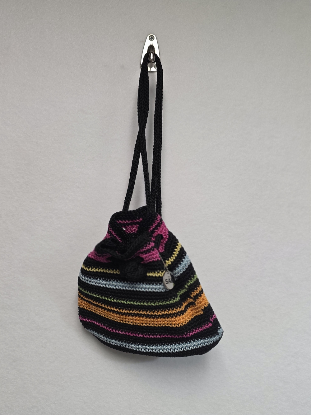The Sak Mini Multicolor Striped Crochet Drawstring Backpack